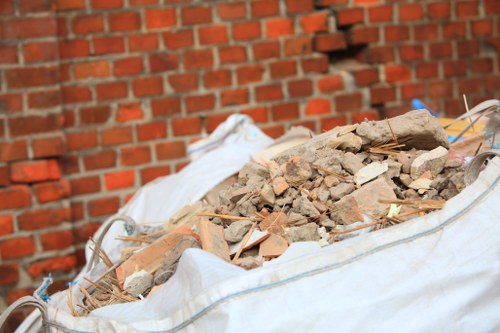 Professionals performing flat clearance in a Forestgate apartment