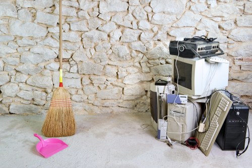 Professional loft clearance team working in a Forestgate home