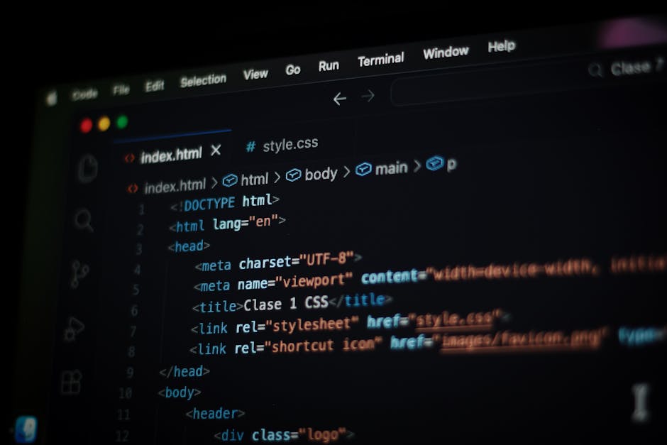 A computer screen displaying a code editor with lines of HTML and CSS code visible. The code includes tags such as <html>, <head>, <title>, and <link>, with syntax highlighting